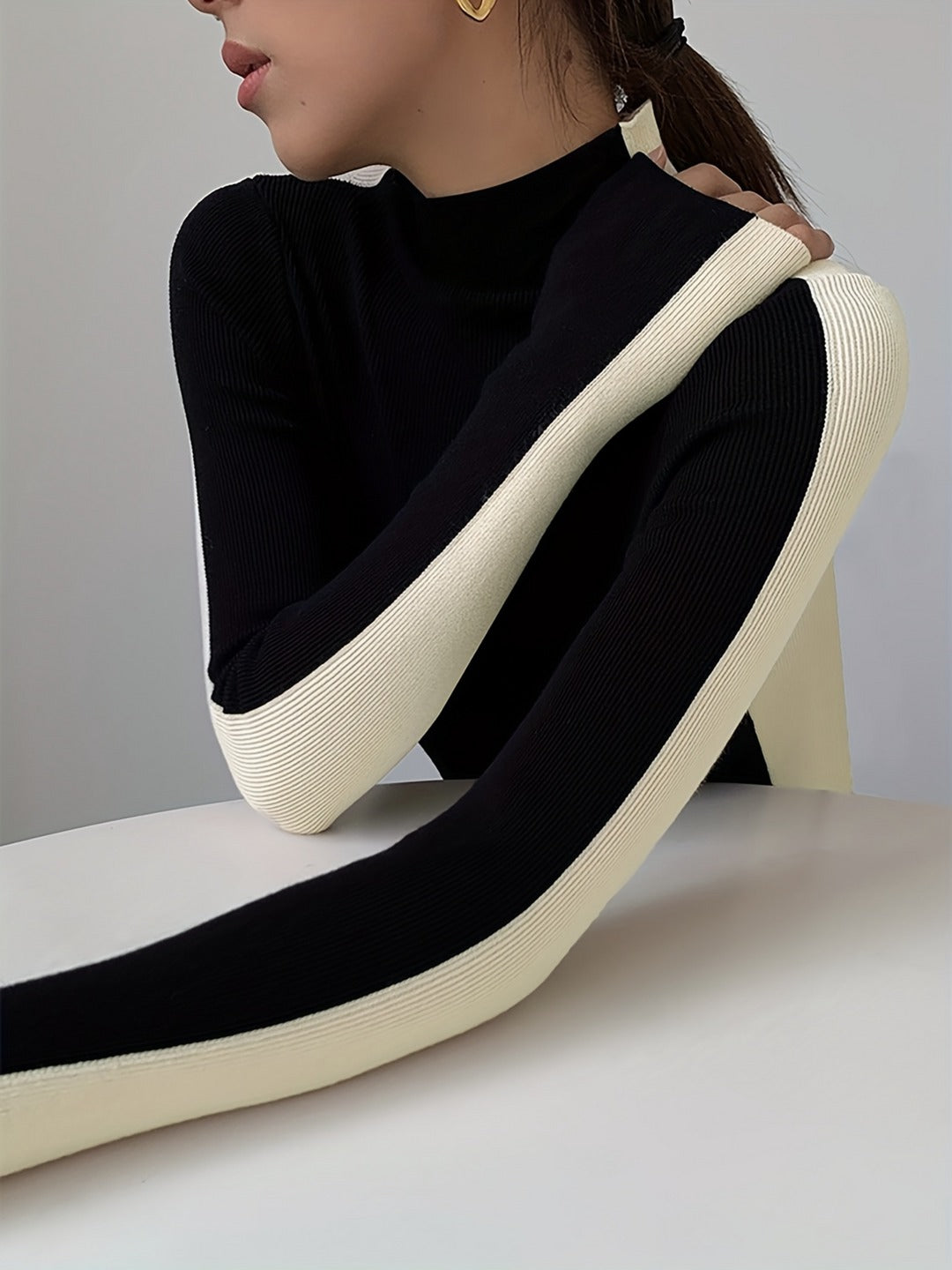 Col roulé en tricot contrasté Eclipse