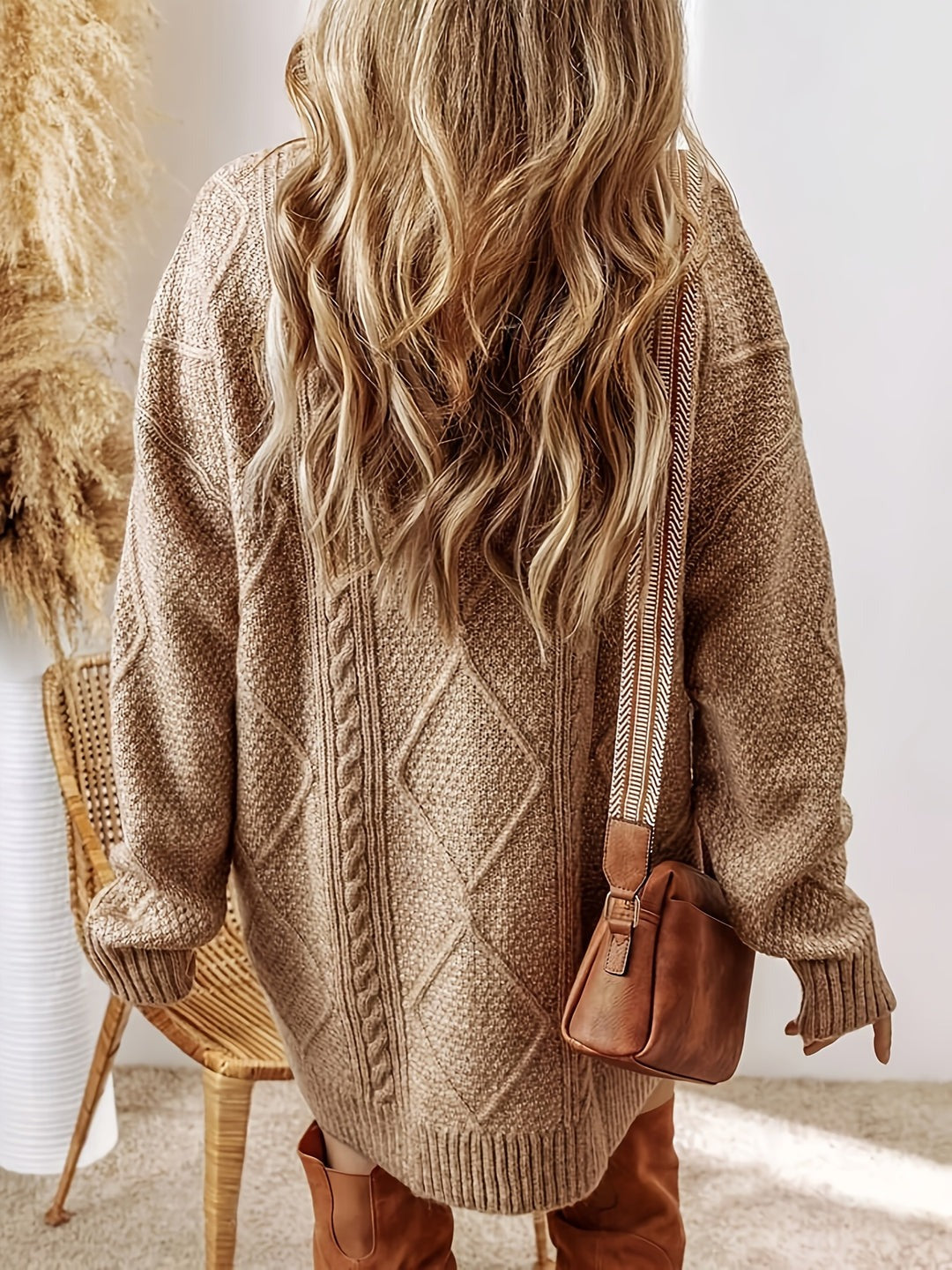 Robe pull en maille torsadée